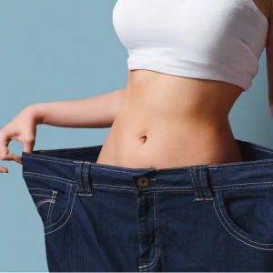 lady shows how PureInsole helped with weight loss